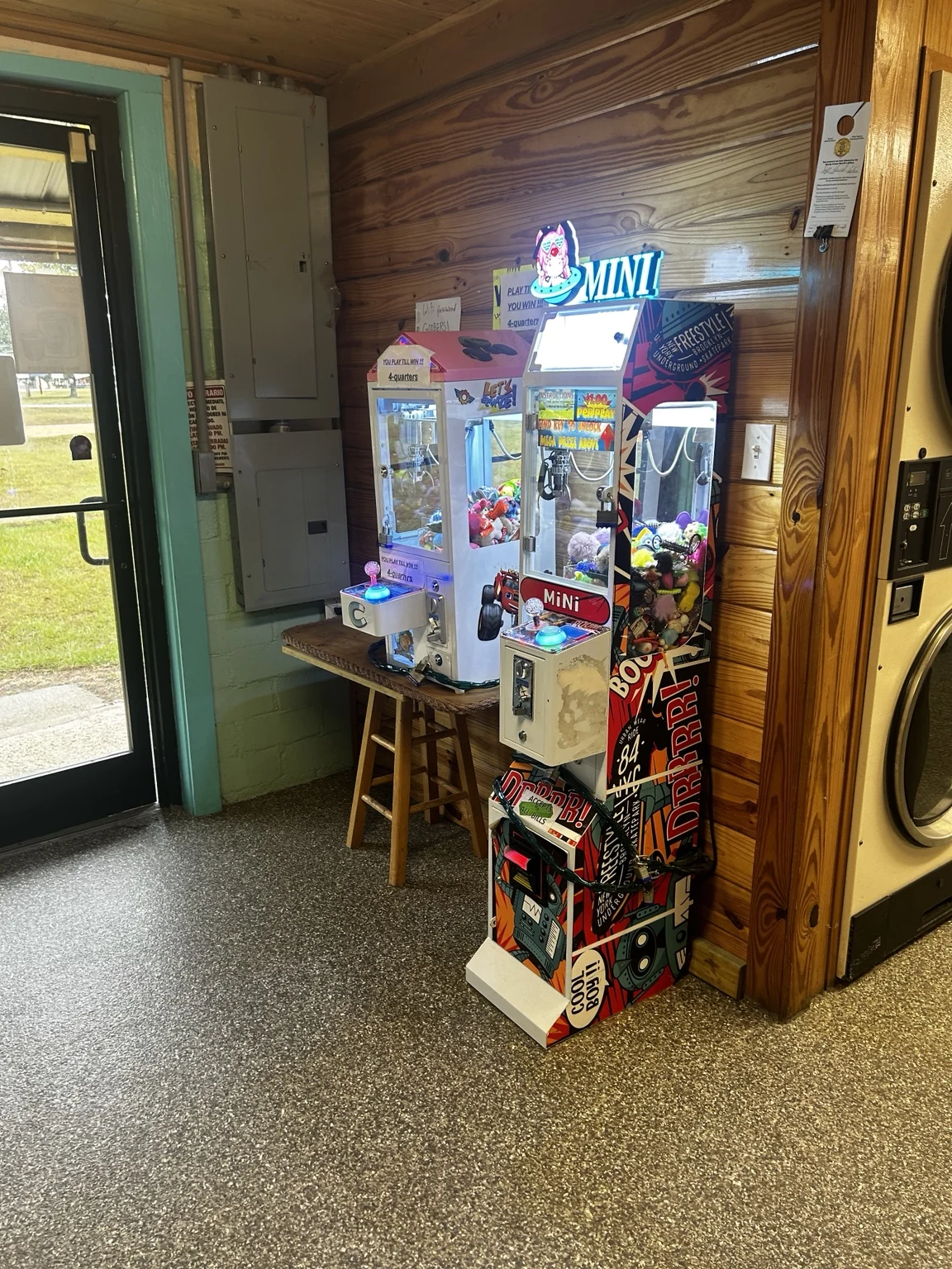 A small arcade corner inside Goobers Laundromat